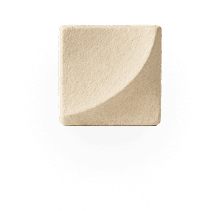 Finished cream-coloured mycelium acoustic panel with a soft curved corner